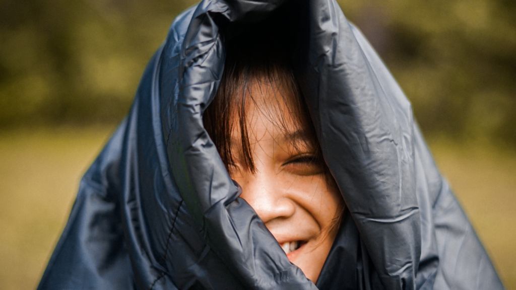 Woman with sleeping bags