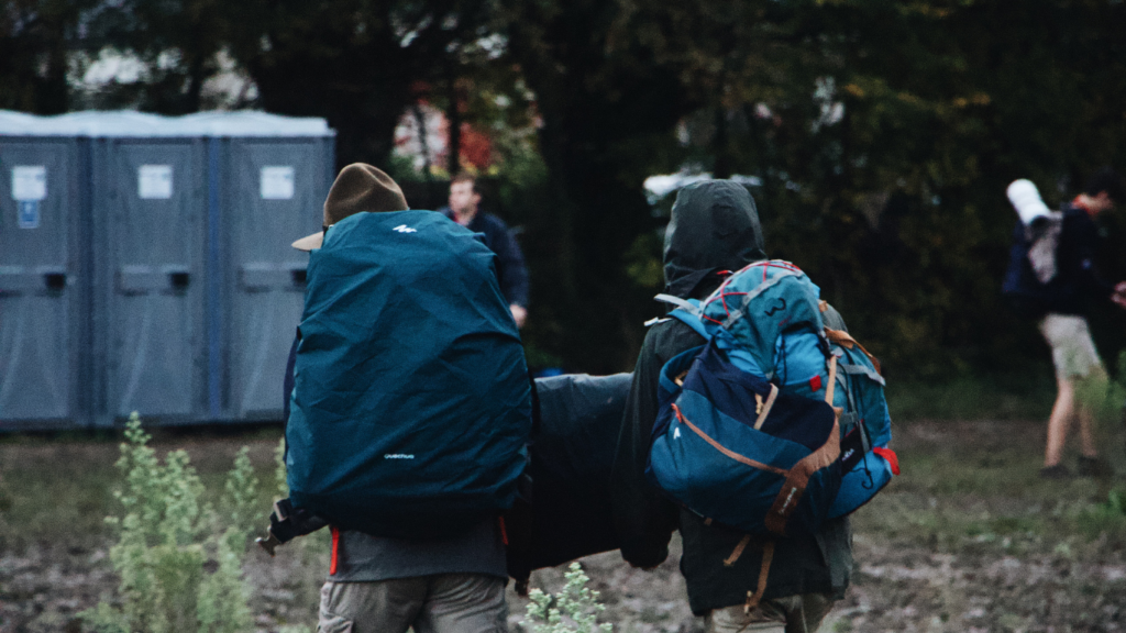 Camping wearing backpack