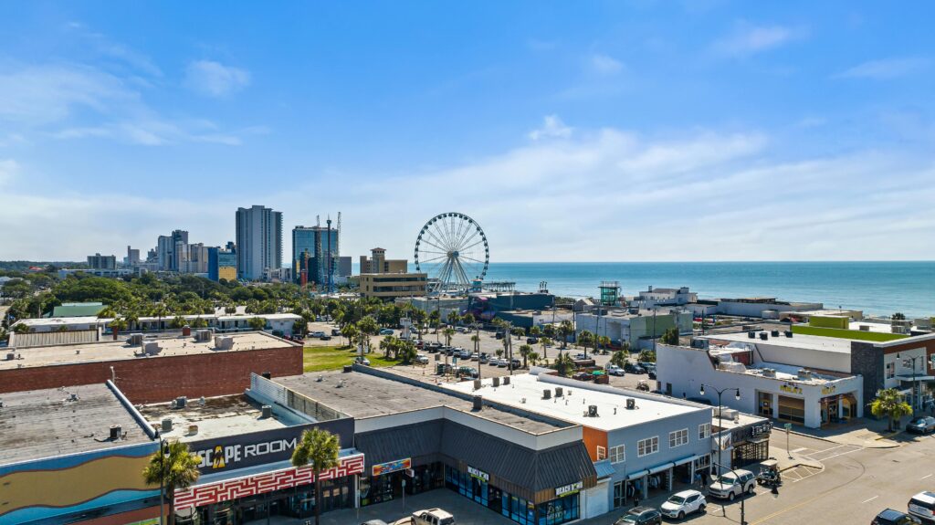 Explore the vibrant cityscape and stunning coastline of Myrtle Beach from above.
